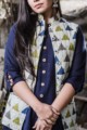 Image for Kusvaa Kj03 Sleeveless Quilted Short Jacket Triangle Prints Closeup
