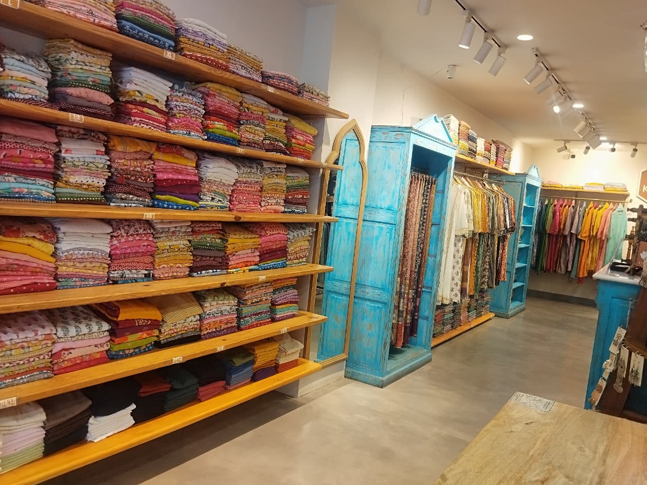 Folded Fabric Shelf Aisle — inside Kusvaa HSR Layout