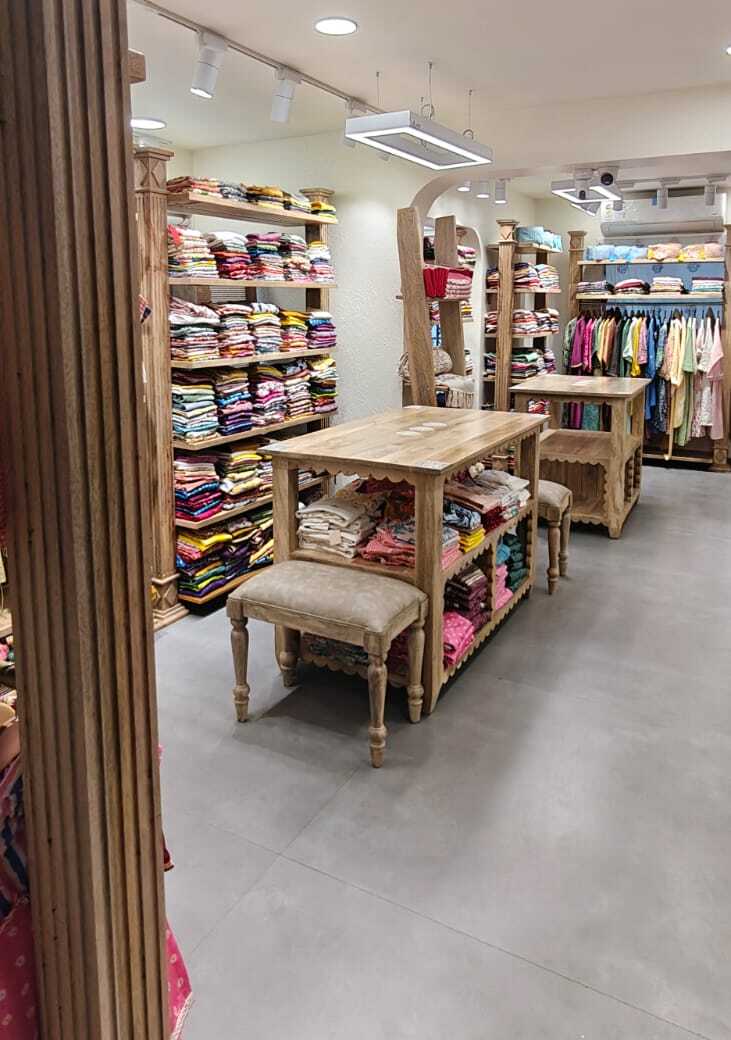 Stacked Kurtas Racks — inside Kusvaa Race Course Road